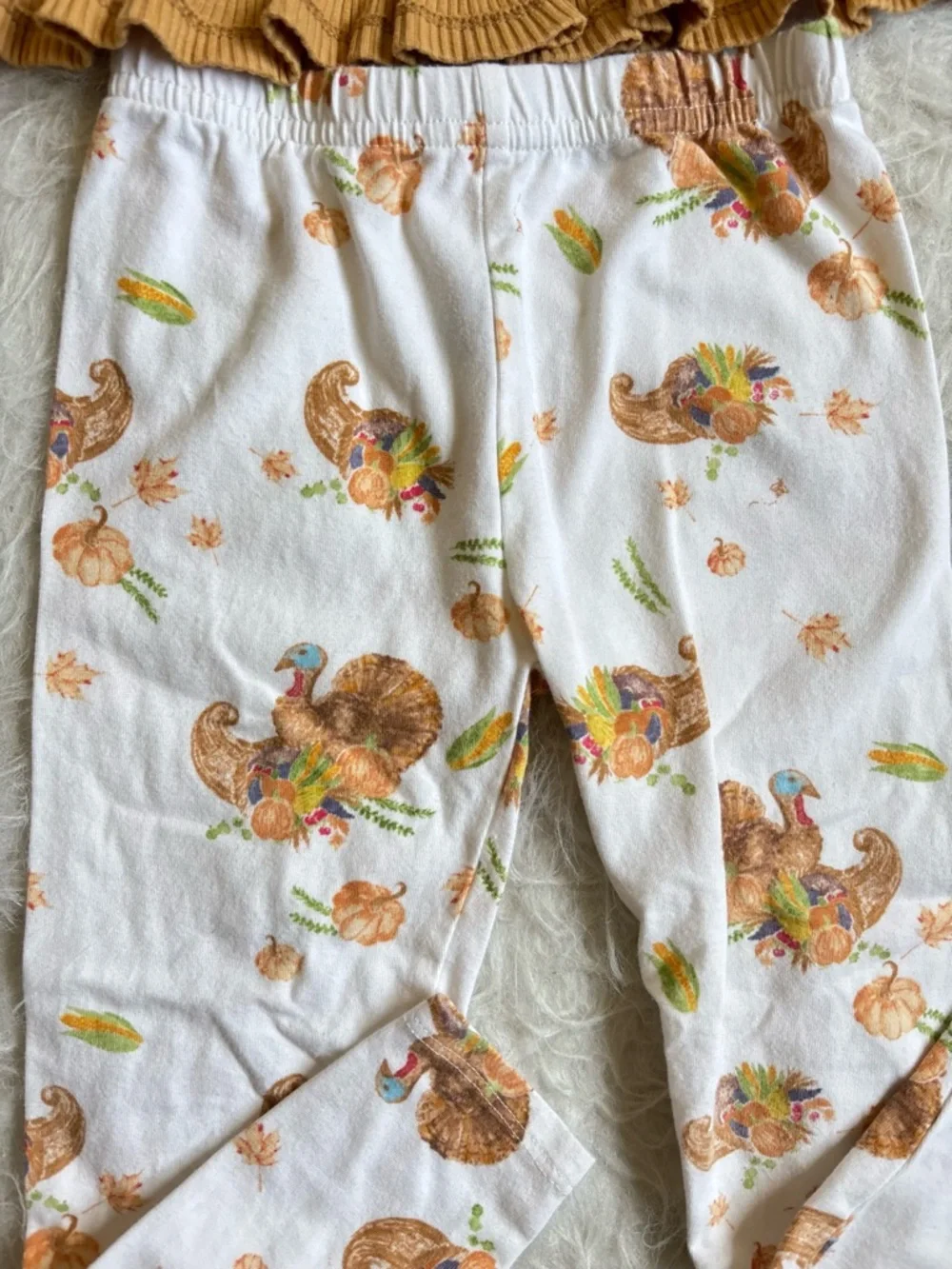 Burt’s Bee’s Toddler Girl Mustard Ruffle Tunic & Thanksgiving AOP Legging Set